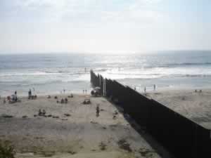 Fence continuing into the Pacific Ocean at Tijuana, Mexico and San Diego, USA.